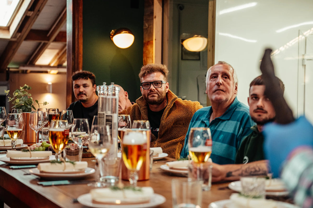 A table of guests enjoying the evening
