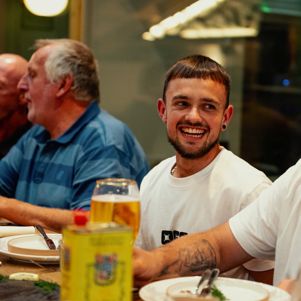Guests laughing at the table