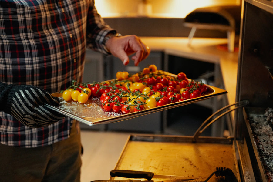 Tomatoes on the vine going onto the fire